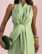 Amara | Mono elegante con cuello halter y lazo en la cintura